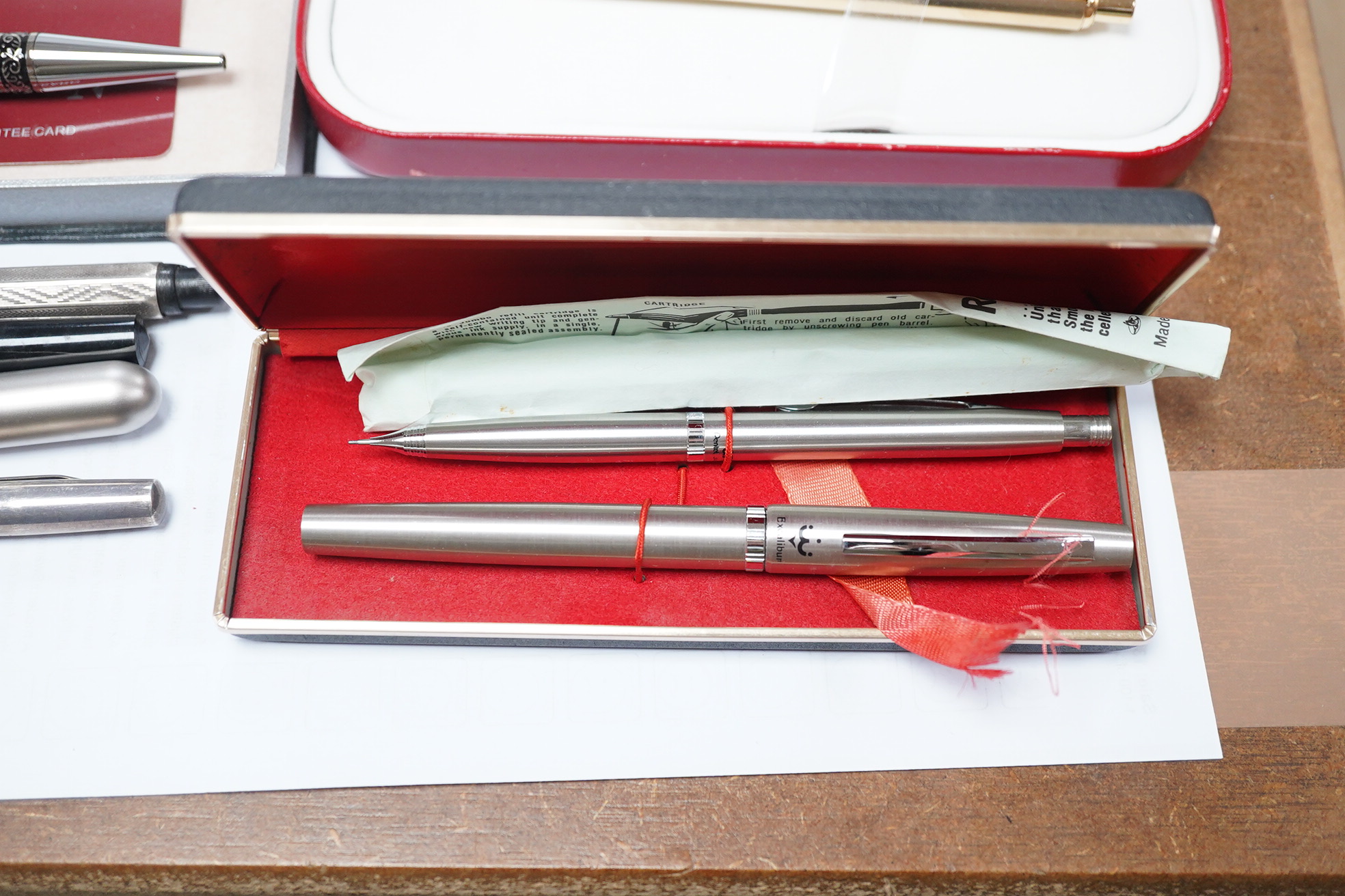 A quantity of pens including a silver fountain pen (8). Condition - fair